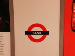 A sign for a bank, illustrating the traditional financial systems that instant withdrawal casinos are moving beyond
