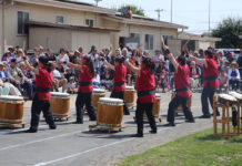 Taiko drummers performing outside