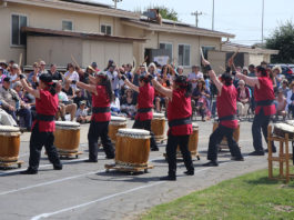 Taiko drummers performing outside