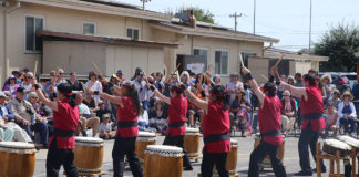 Taiko drummers performing outside