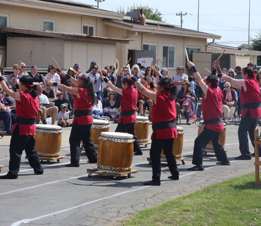 Taiko drummers performing outside