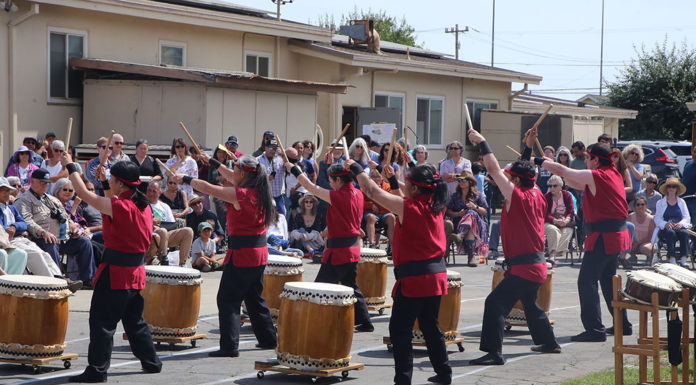 Taiko drummers performing outside