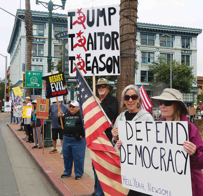 trump protest 1 People line main street in Watsonville Saturday to protest President Trump's policies.