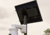 A close-up image of a Flock license plate reader.