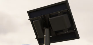 A close-up image of a Flock license plate reader.