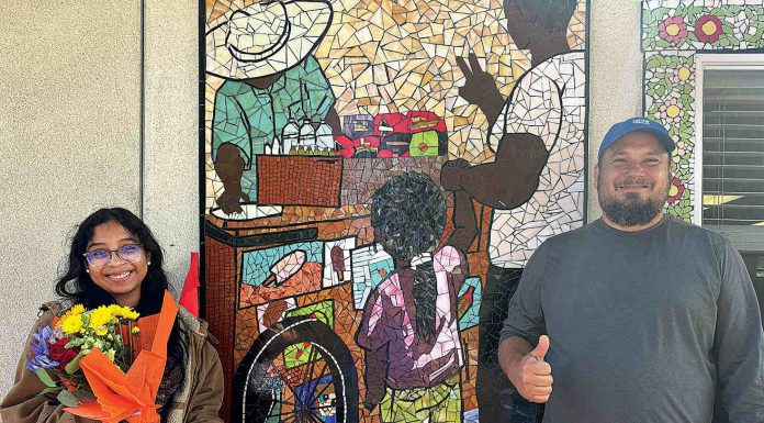 Students cut ribbon on mosaic artwork