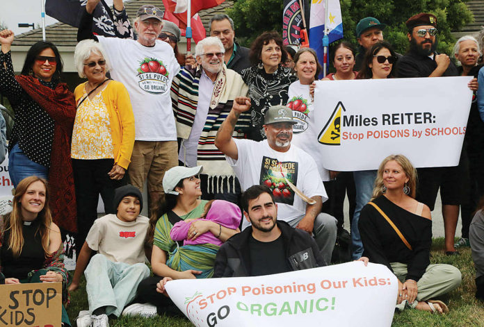 pesticide protest 1 About 50 people gather in front of Driscoll’s headquarters on Westridge Drive in Watsonville to protest pesticide use in area agricultural fields.