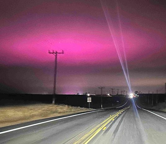 Why does the sky glow purple?