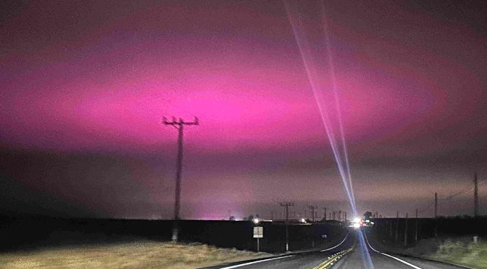 Why does the sky glow purple?