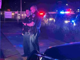 Man shot to death in Main Street business center