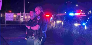 Man shot to death in Main Street business center