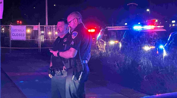 Man shot to death in Main Street business center