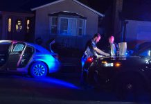 Photo story: Handgun, stolen vehicle recovered in traffic stop