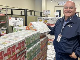 Watsonville Airport prepares for Super Bowl arrivals Dave Paz, general manager at S. Matinelli and Co.. assembles a sampling of beverage products Monday to add to the Pajaro Valley Chamber of Commerce and Agriculture’s red-carpet Super Bowl welcome party at the Watsonville Municipal Airport this week.