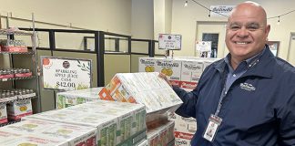 Dave Paz, general manager at S. Matinelli and Co.. assembles a sampling of beverage products Monday to add to the Pajaro Valley Chamber of Commerce and Agriculture’s red-carpet Super Bowl welcome party at the Watsonville Municipal Airport this week.