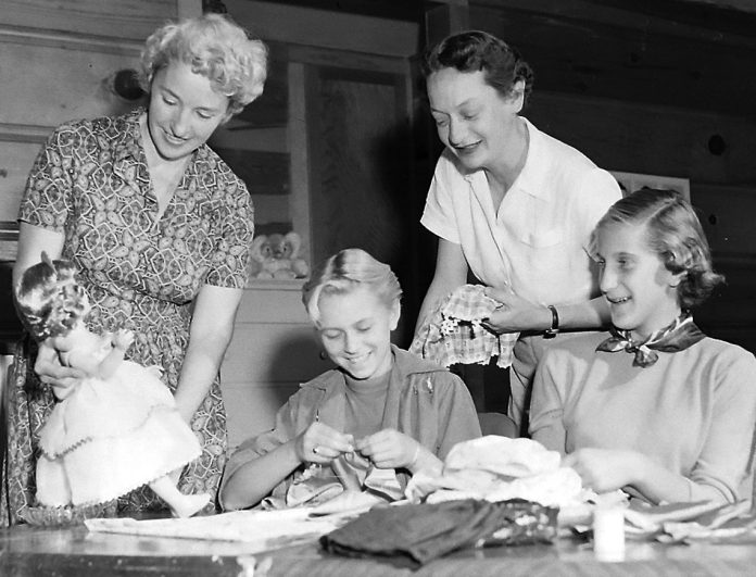 These folks prepare for an exhibit at Salsipuedes School by the PTA on Oct. 20, 1955