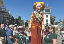 “Lucky” the cowgirl is part of the welcoming group at the opening of the 2024 Santa Cruz County Fair.