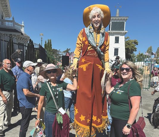 “Lucky” the cowgirl is part of the welcoming group at the opening of the 2024 Santa Cruz County Fair.