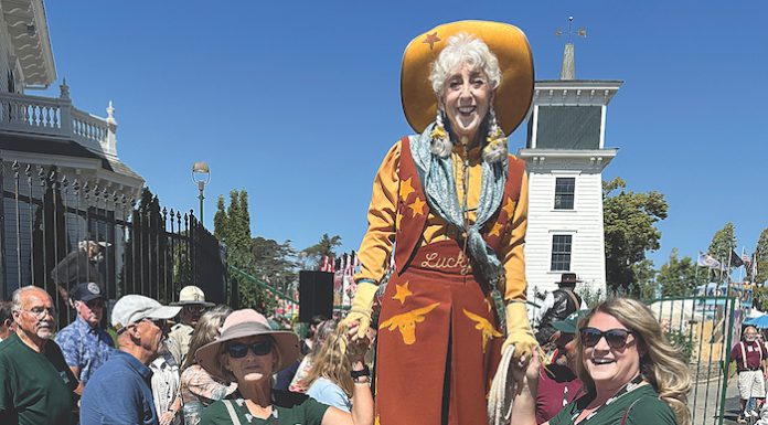 “Lucky” the cowgirl is part of the welcoming group at the opening of the 2024 Santa Cruz County Fair.