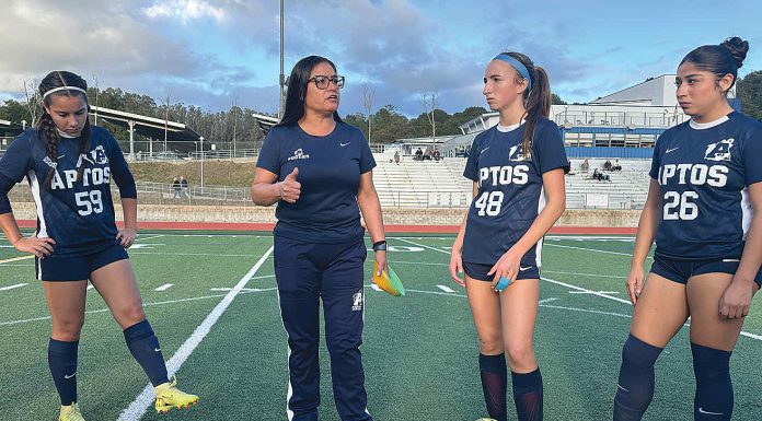National leadership award lands in local hands Gina Castañeda (second from left) works with the girls varsity soccer team at Aptos High School
