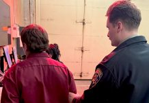 A California Highway Patrol officer takes a man into custody after he found an unregistered handgun in his possession during a car stop.