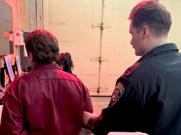 A California Highway Patrol officer takes a man into custody after he found an unregistered handgun in his possession during a car stop.