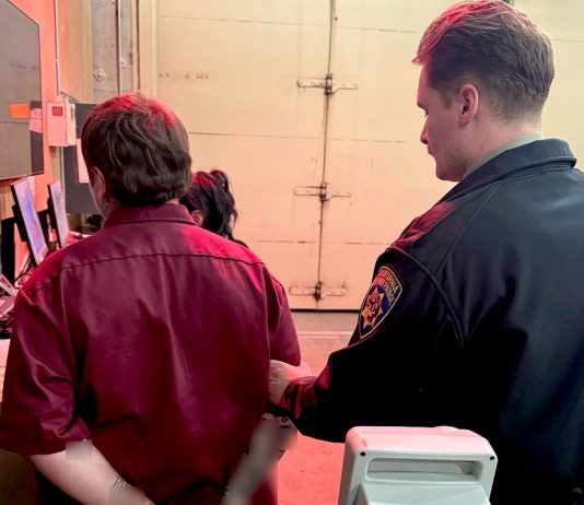 A California Highway Patrol officer takes a man into custody after he found an unregistered handgun in his possession during a car stop.