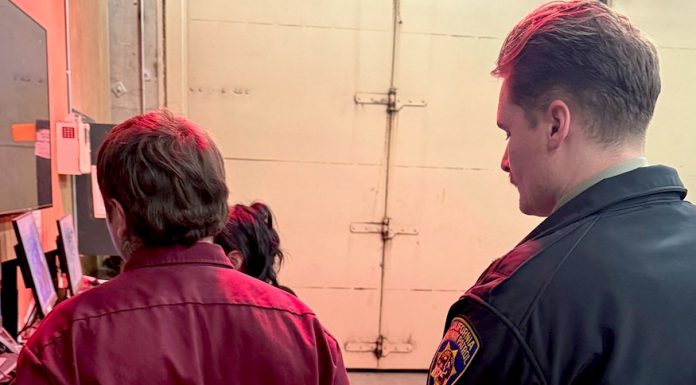 A California Highway Patrol officer takes a man into custody after he found an unregistered handgun in his possession during a car stop.