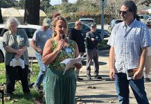 Phoenix Artemisa (center heds up a public meeting Feb. 28 at Pinto Lake City Park about a proposed Battery Energy Storage System on Minto Road in Watsonville.