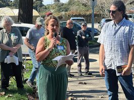 Phoenix Artemisa (center heds up a public meeting Feb. 28 at Pinto Lake City Park about a proposed Battery Energy Storage System on Minto Road in Watsonville.