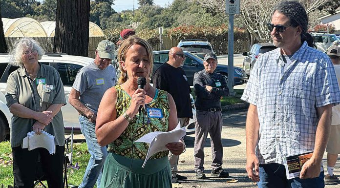 Phoenix Artemisa (center heds up a public meeting Feb. 28 at Pinto Lake City Park about a proposed Battery Energy Storage System on Minto Road in Watsonville.