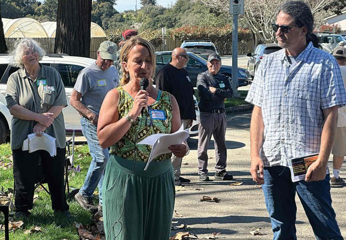 Phoenix Artemisa (center heds up a public meeting Feb. 28 at Pinto Lake City Park about a proposed Battery Energy Storage System on Minto Road in Watsonville.
