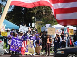 Photo Story: No Kings rallies take place throughout Santa Cruz County, across United States Around 600 people join the No Kings protest against President Trump Saturday in Watsonville Plaza along with thousands of others around the nation. From people in strollers to those in wheelchairs and on walkers, people waved signs and chanted "No Trump, No ICE" and "No War with Iran" during the two-hour event organized by Indivisible Pajaro Valley.