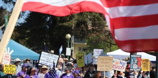 Around 600 people join the No Kings protest against President Trump Saturday in Watsonville Plaza along with thousands of others around the nation. From people in strollers to those in wheelchairs and on walkers, people waved signs and chanted "No Trump, No ICE" and "No War with Iran" during the two-hour event organized by Indivisible Pajaro Valley.