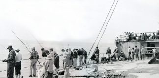 A crowd gathers on the deck of the SS Palo Alto, colloquially known as the “Cement Ship,” on May 31, 1954.