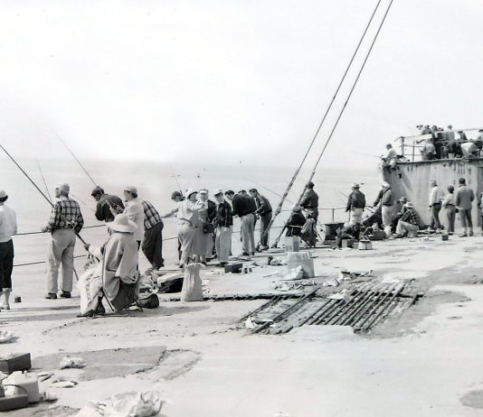 A crowd gathers on the deck of the SS Palo Alto, colloquially known as the “Cement Ship,” on May 31, 1954.