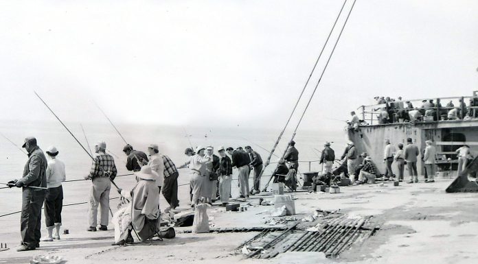 A crowd gathers on the deck of the SS Palo Alto, colloquially known as the “Cement Ship,” on May 31, 1954.