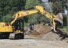 A crew from Granite Construction works on Reach 6 of the Pajaro River at Watsonville Project along Corralitos Creek. (