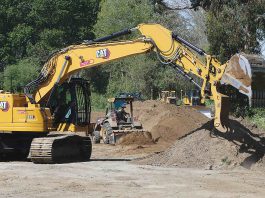 A crew from Granite Construction works on Reach 6 of the Pajaro River at Watsonville Project along Corralitos Creek. (