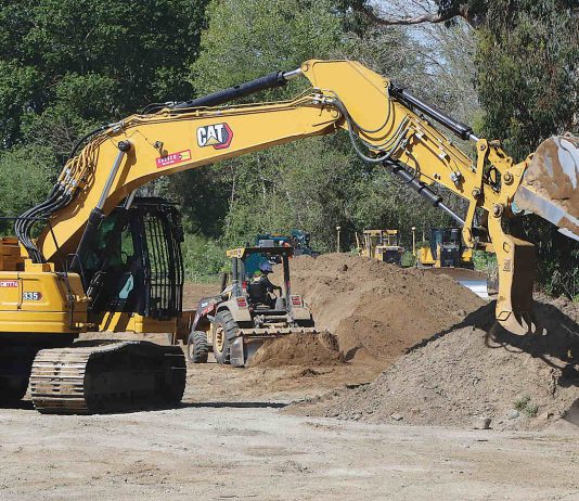 A crew from Granite Construction works on Reach 6 of the Pajaro River at Watsonville Project along Corralitos Creek. (