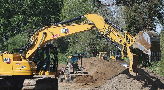 A crew from Granite Construction works on Reach 6 of the Pajaro River at Watsonville Project along Corralitos Creek. (
