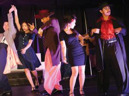 Drama students at Pajaro Valley High School work through a rehearsal of “"Zoot Suit"” Monday.
