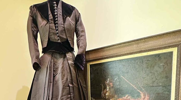 A wedding dress, worn by Marty Silliman Edrington, is part of an ensemble from the 1890’s is part of a new exhibit at the Pajaro Valley Historical Association that showcases bridal attire from 1890 to 1990.