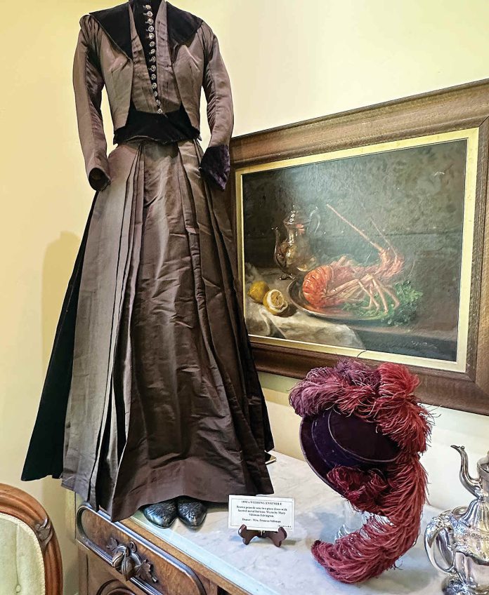 A wedding dress, worn by Marty Silliman Edrington, is part of an ensemble from the 1890’s is part of a new exhibit at the Pajaro Valley Historical Association that showcases bridal attire from 1890 to 1990.
