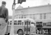 A city bus rolls along Main Street into the Watsonville Transit Square on March 23, 1954.