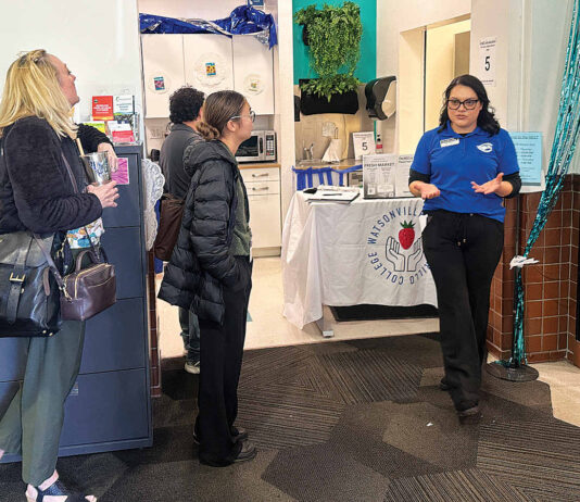 Sofia Ramirez leads a tour Monday of the new Wellness Center and Food Pantry at the Watsonville Cabrillo College Center.