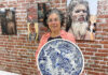 Exhibit on body art comes to PV Arts Roberta Valdez shows a ceramic work by Britton McFetridge. Valdez is the curator of the current exhibit at PV Arts in Watsonville. (Tarmo Hannula/The Pajaronian)