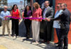 Santa Cruz County District Attorney Jeff Rosell, left, joins Aztecas Youth Soccer Academy founder Gina Castañeda, Chief Probation Officer Sandra Mendez, 1440 Multiversity co-creator Joanie Kriens, Santa Cruz County Superintendent of Schools Faris Sabbah, Ramon Gomez from Santa Cruz County Supervisor Felipe Hernandez’s office and Watsonville Police Chief Brian Shab in a ribbon-cutting ceremony at Aztecas new clubhouse.