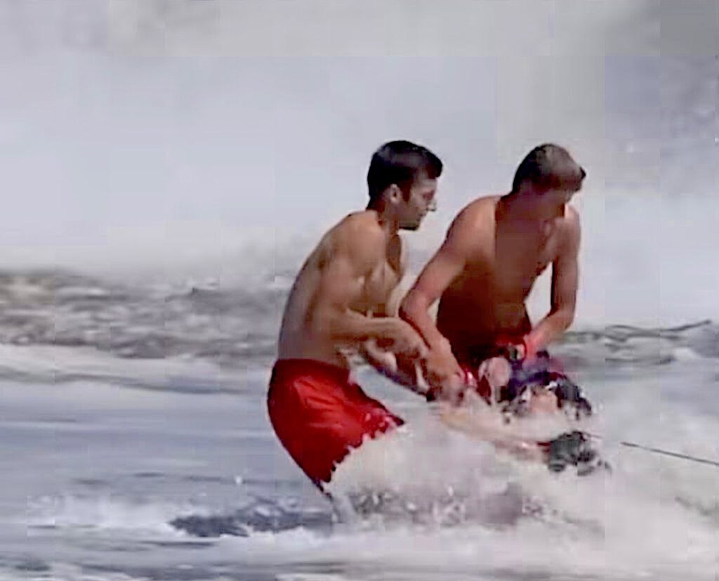 Ryder Williams and another lifeguard help rescue a 10-year-old boy from the waves at Seabright Beach on July 25. (Scott Vander Dussen/@santacruznow)