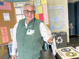 Joseph Eaton drops his ballot in the box at the City of Watsonville Civic Plaza voting station on June 2. (Tarmo Hannula/Pajaronian file)
